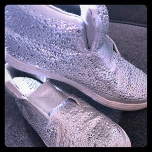 Rhinestoned high top tennis.